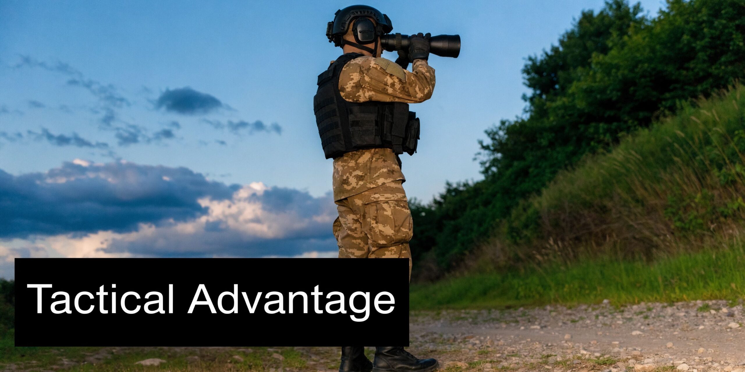 A soldier in camouflage uniform using long-range binoculars for surveillance in an outdoor landscape at twilight.