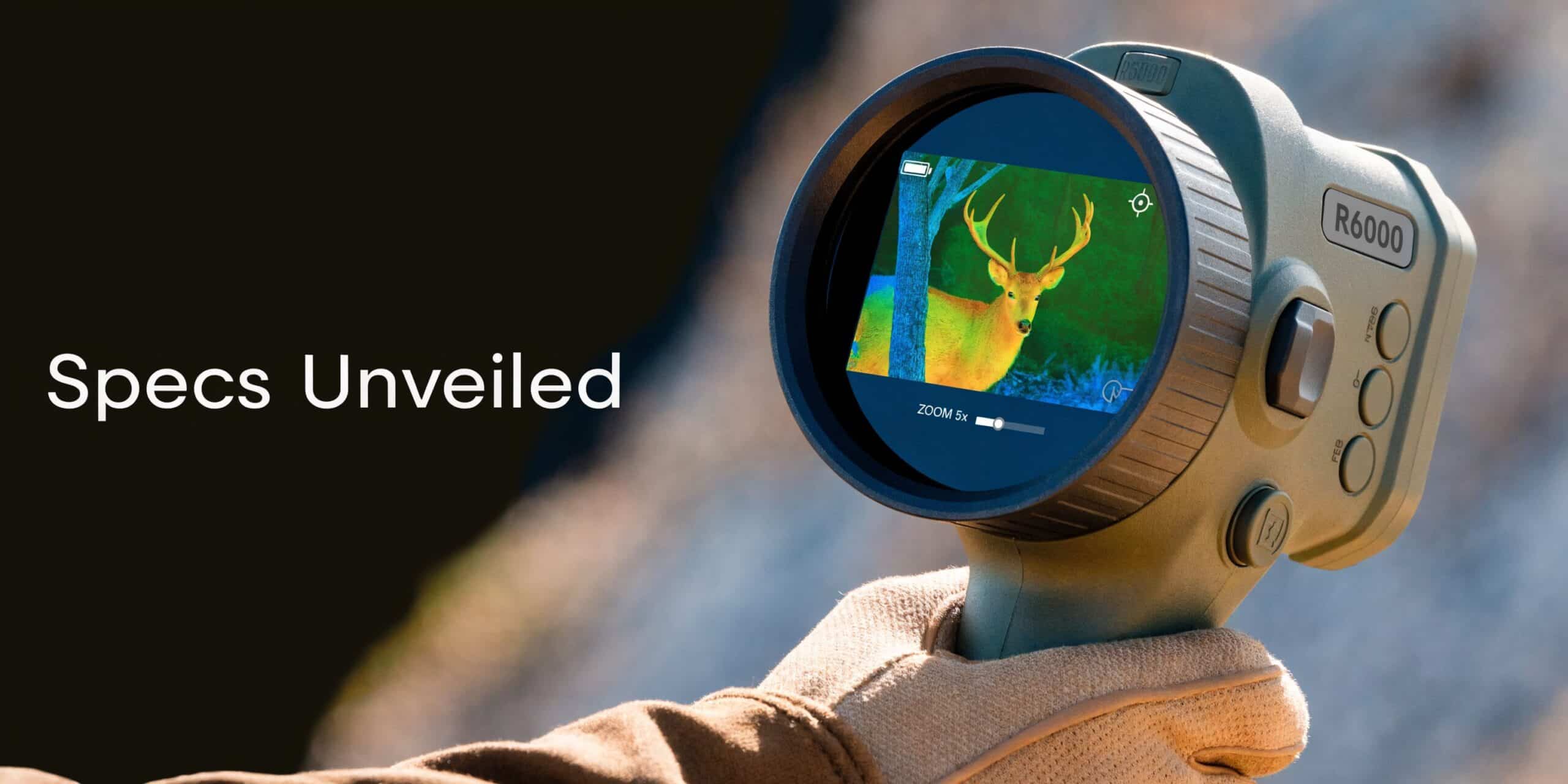 A hand wearing a glove holding a thermal hunting camera displaying a deer on its screen.